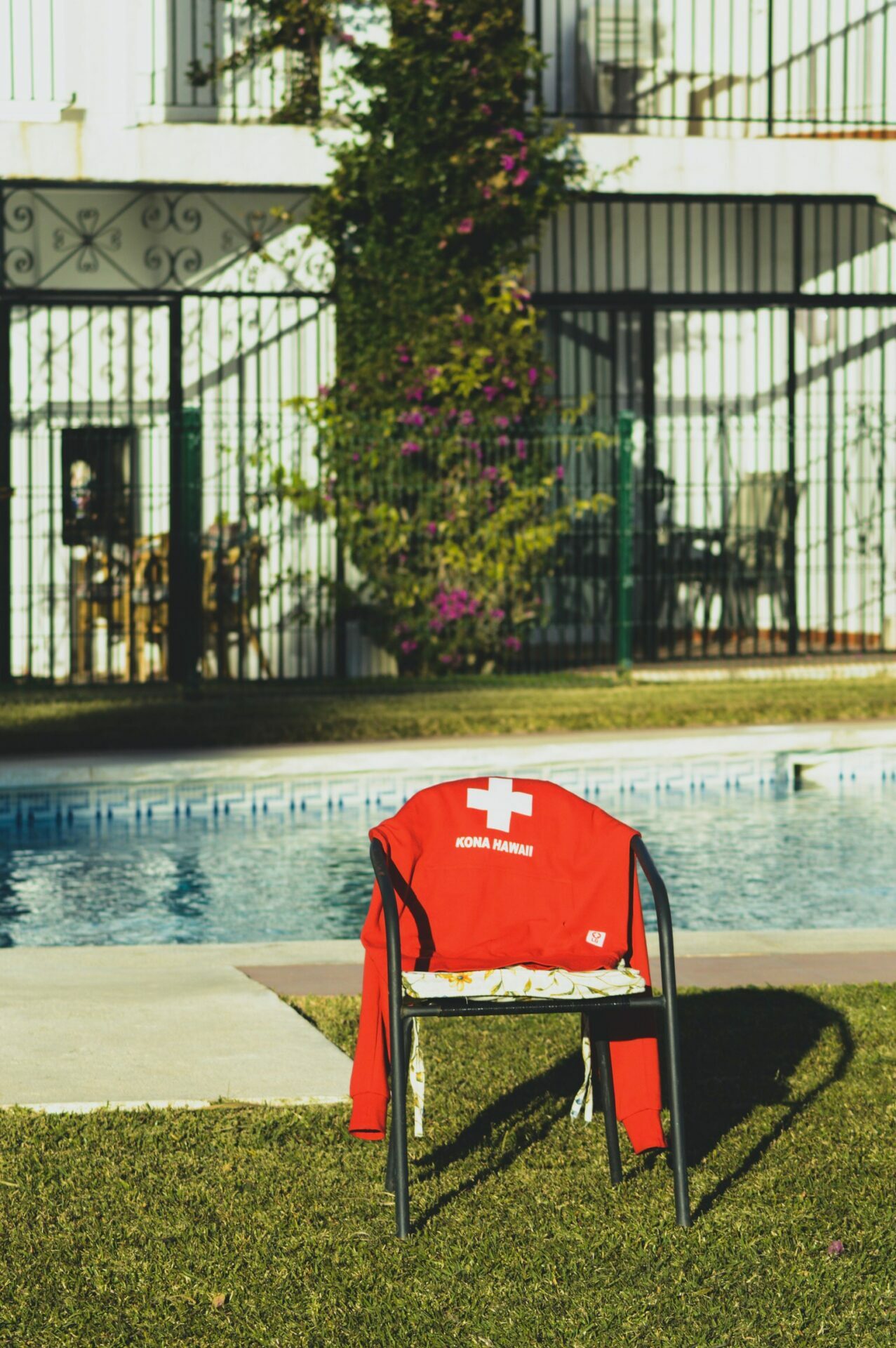 black armchair near pool