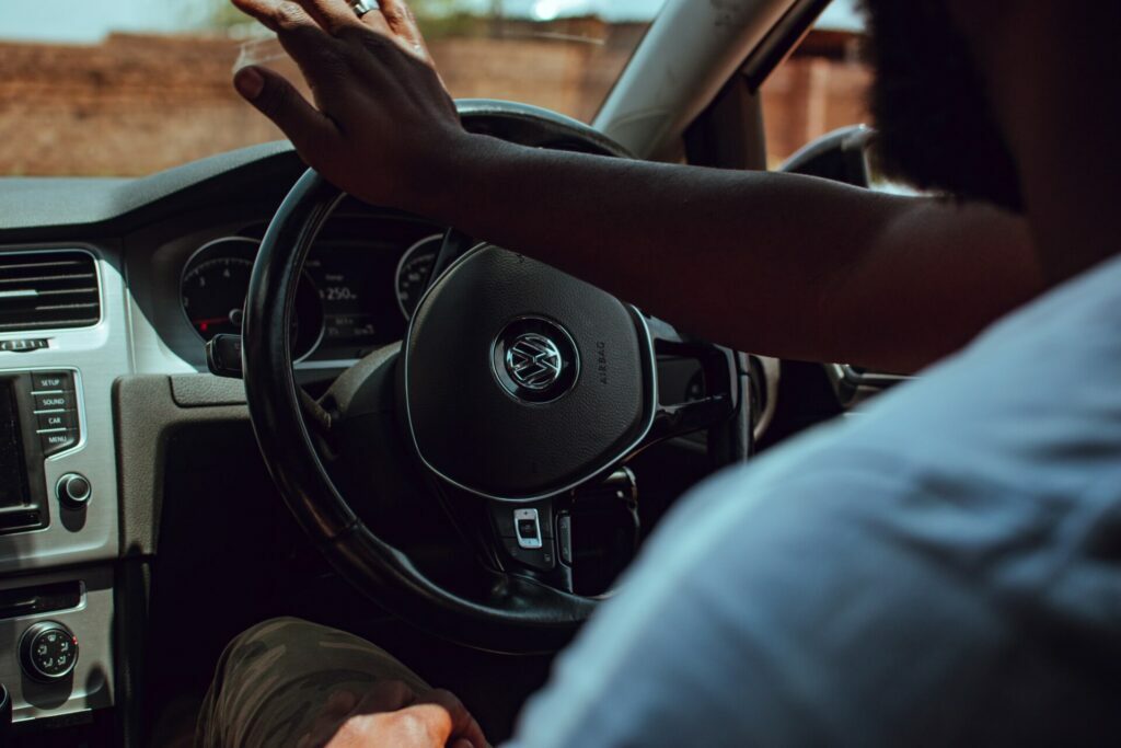 person sitting in driver seat