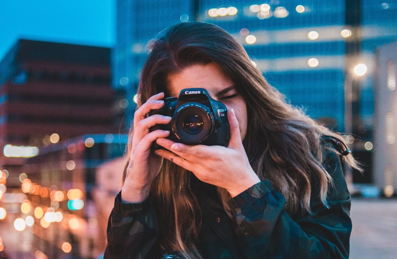 woman using camera