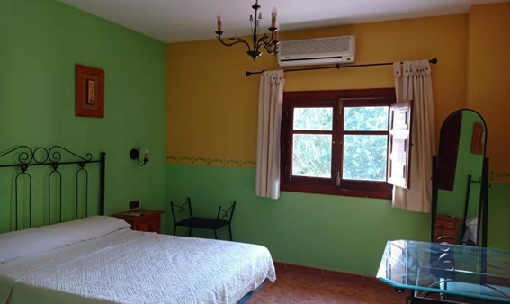 Interior de una habitación de Camping Godoy - Foto de Booking.com