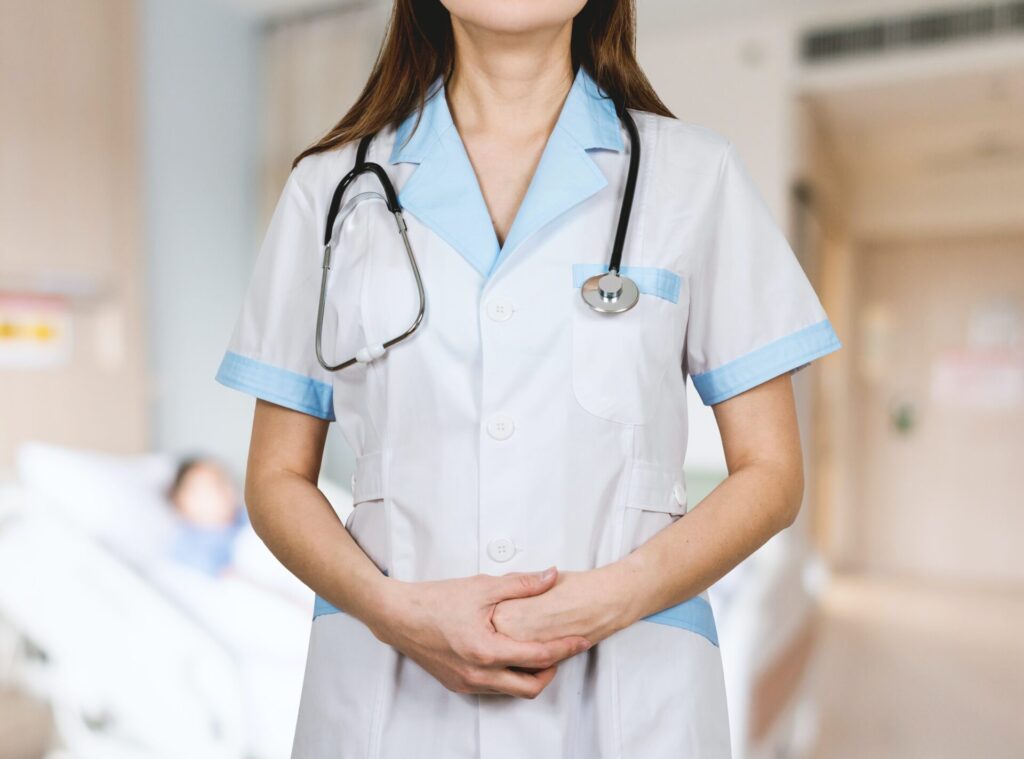 woman in white button up shirt and blue stethoscope Oferta de empleo en Talavera: Se necesita enfermero /a en residencia